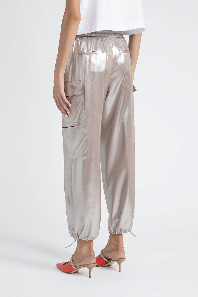 Baggy trousers in flowing silver laminated viscose twill  