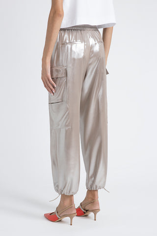 Baggy trousers in flowing silver laminated viscose twill  