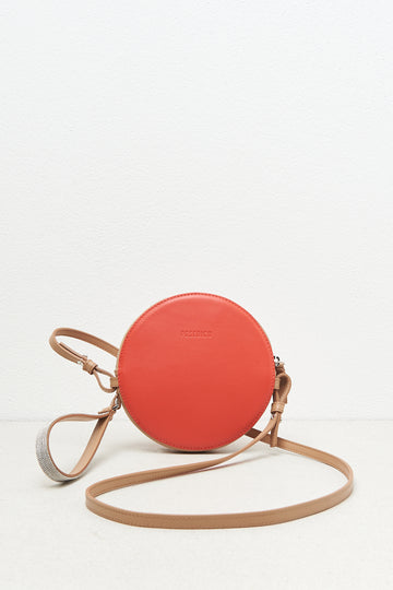 Round genuine leather bag with wristband and shoulder strap  