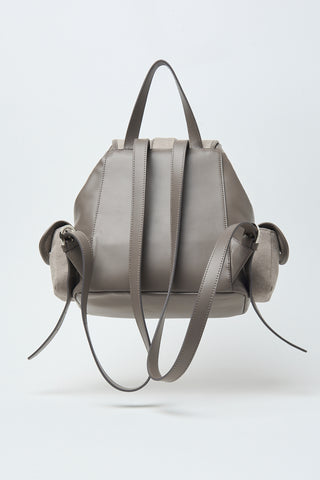 Genuine leather and canvas backpack with side pockets