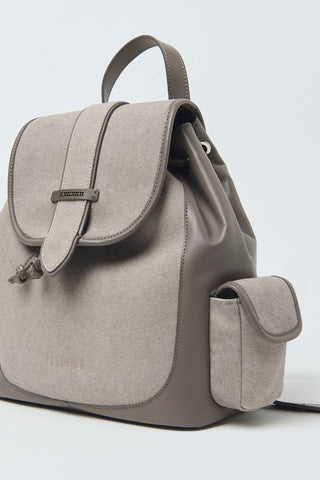 Genuine leather and canvas backpack with side pockets