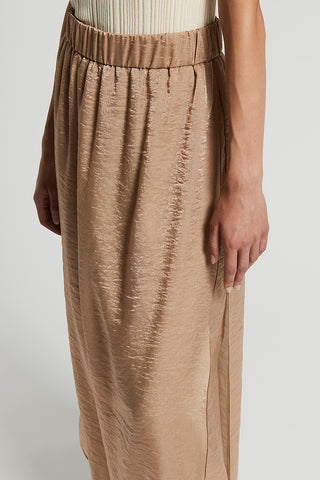 Long skirt in fluid organza with wet effect