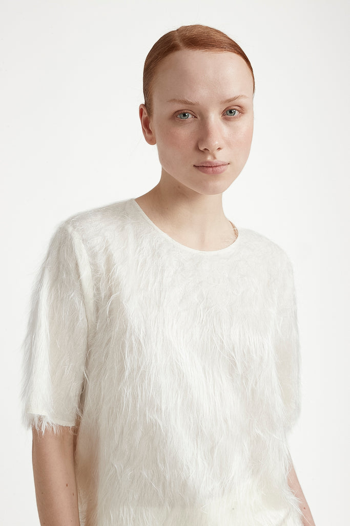 Top with floating viscose threads  