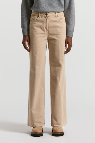 Garment-dyed denim jeans