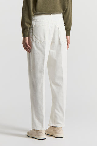 Garment-dyed denim jeans