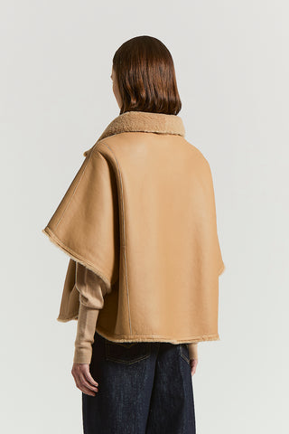 Reversible real shearling cape