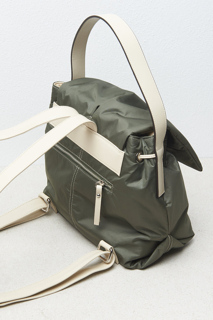 Padded nylon backpack with leather inserts  
