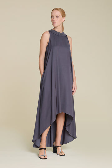 Exquisite asymmetric dress in luminous  fluid viscose satin with deep scoop back neck and diamond cut chain detail on neckline  