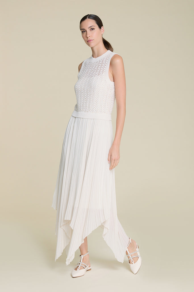 Exquisite dress with asymmetric pleated skirt and mesh top in pure cotton and shimmering sequins  