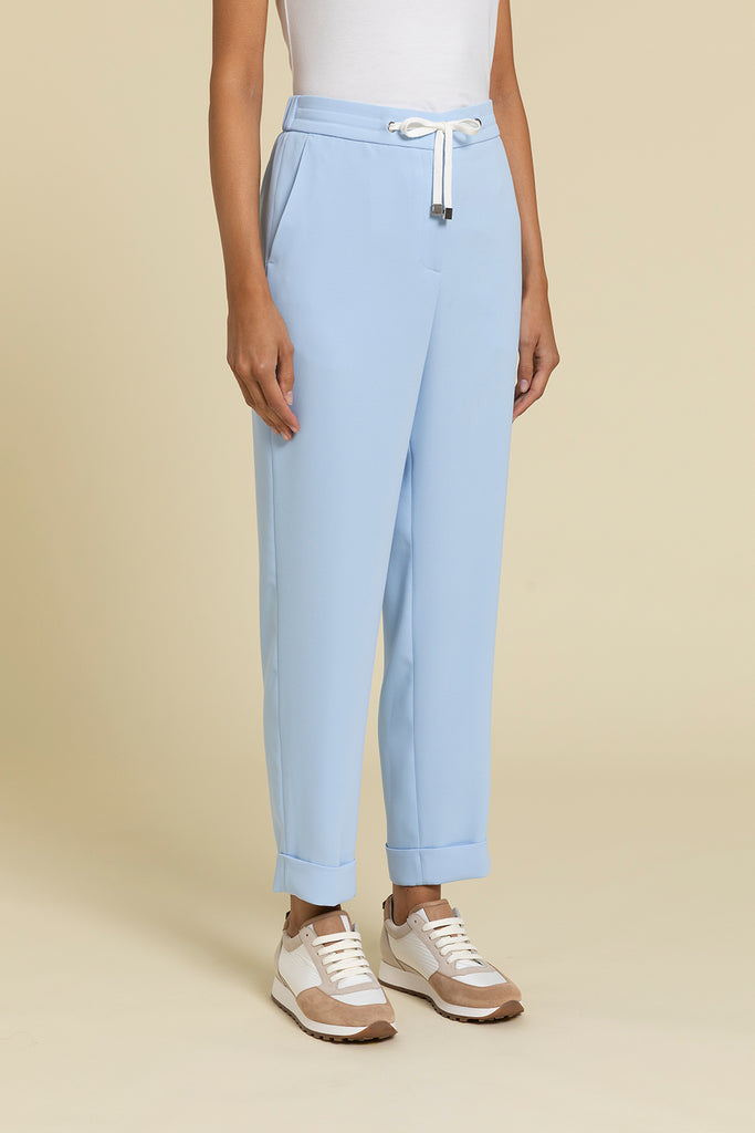 Pull-up trousers with tailored turn ups in fluid crepe cady  