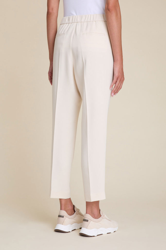Slim pull-on trousers in fluid viscose/crepe cady with diamond cut chain trim  