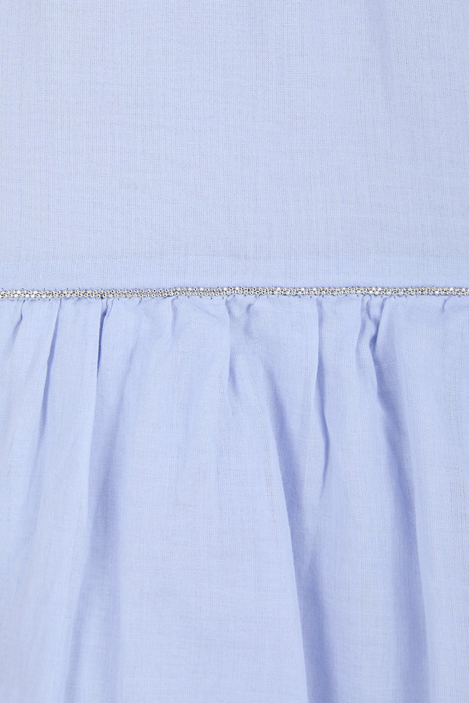 Cool flounced skirt in light cotton gauze with diamond cut chain trim  