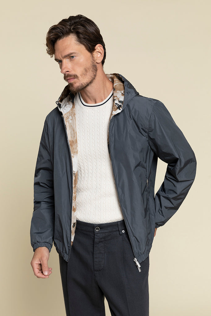 REVERSIBLE JACKET IN WATERPROOF TECHNICAL FABRIC WITH PRINTED LINING  