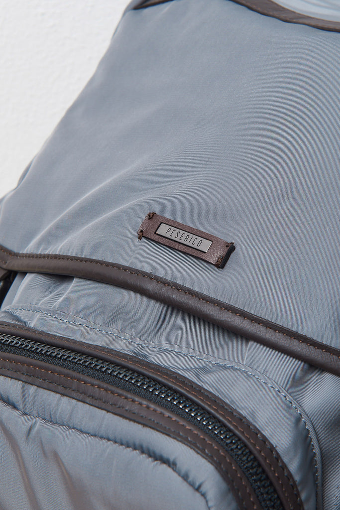BACKPACK WITH POCKETS IN TECHNICAL FABRIC AND LEATHER INSERTS  