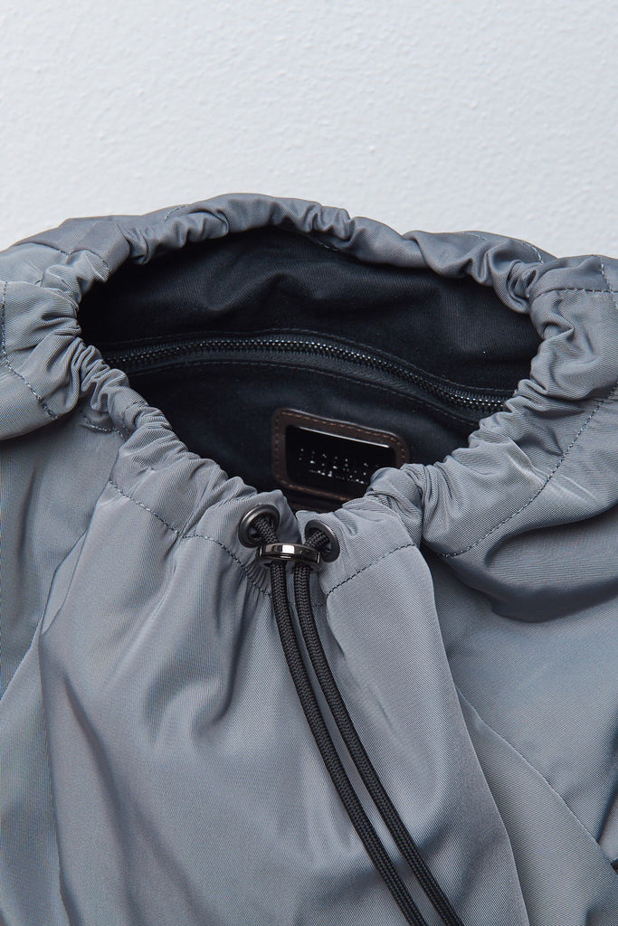 BACKPACK WITH POCKETS IN TECHNICAL FABRIC AND LEATHER INSERTS  
