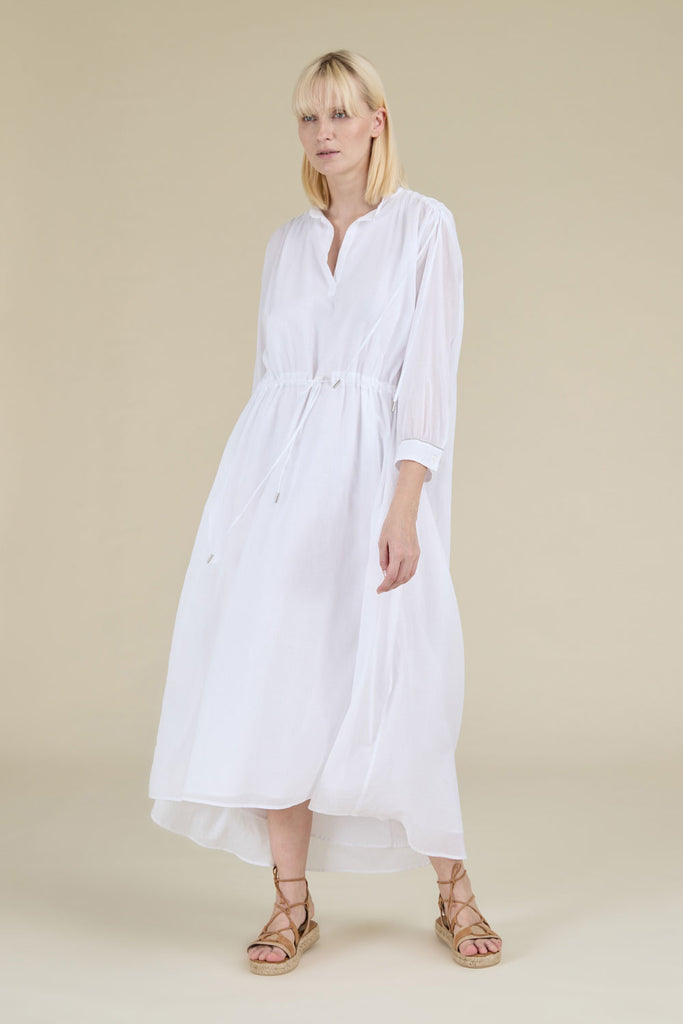 Ample gathered tunic with drawstring in light pure cotton gauze with diamond cut chain trim on wrists  