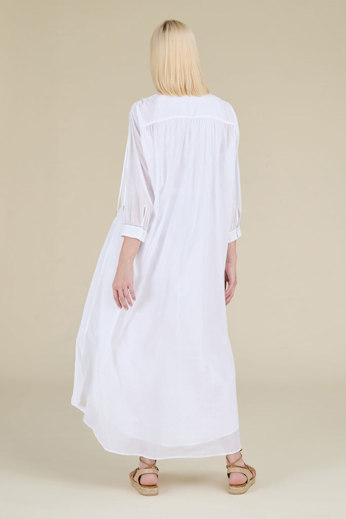 Ample gathered tunic with drawstring in light pure cotton gauze with diamond cut chain trim on wrists  