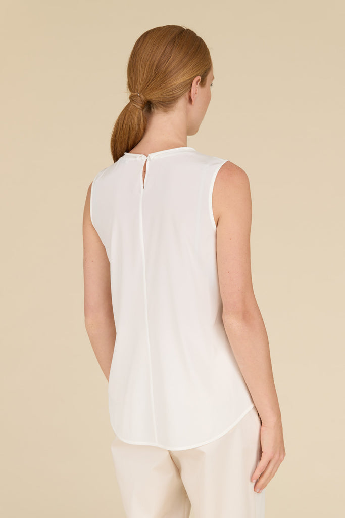 Elegant top with knit collar in comfort silk crepe de chine with luminous Watery embroidery  