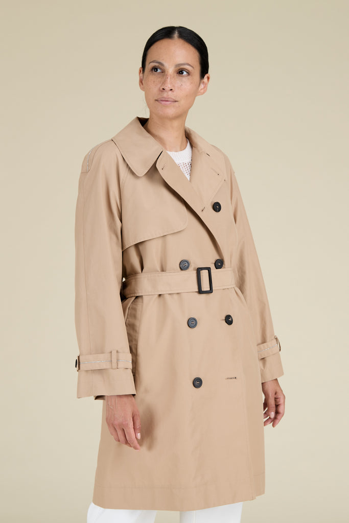 Timeless waterproof technical cotton trenchcoat embellished with diamond cut chain trim on tabs  