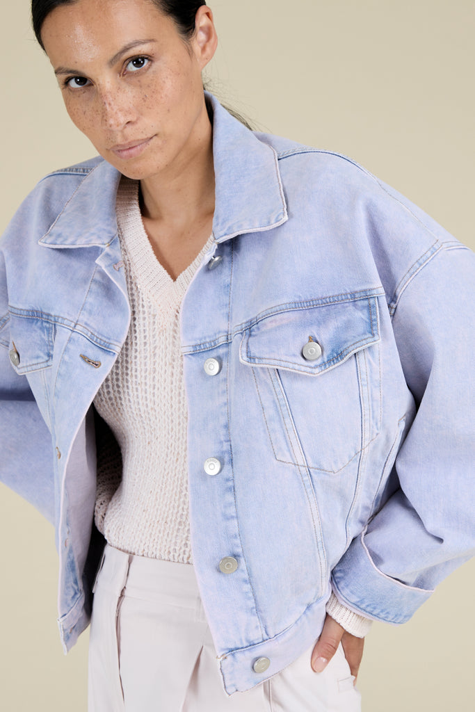 Oversize trucker jacket in overdyed bleach washed denim  