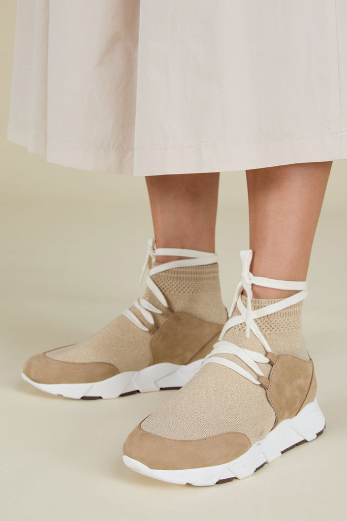 Sneakers in comfortable knit with lurex details  leather inserts and unusual gladiator lacing  