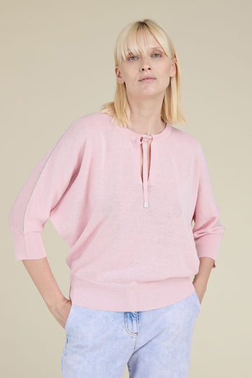 Light plain knit cropped sweater in cool linen cotton crŠpe yarn with diamond cut chain trim on shoulders and drawstring neck  