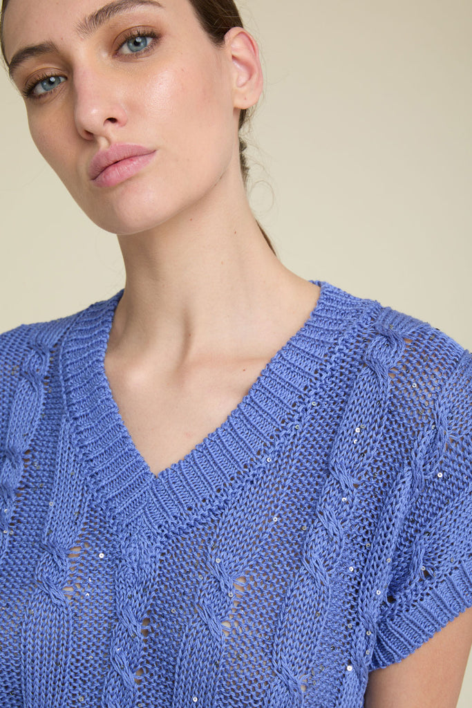 Cable-knit gilet in pure cotton yarn illuminated by delicate sequins  